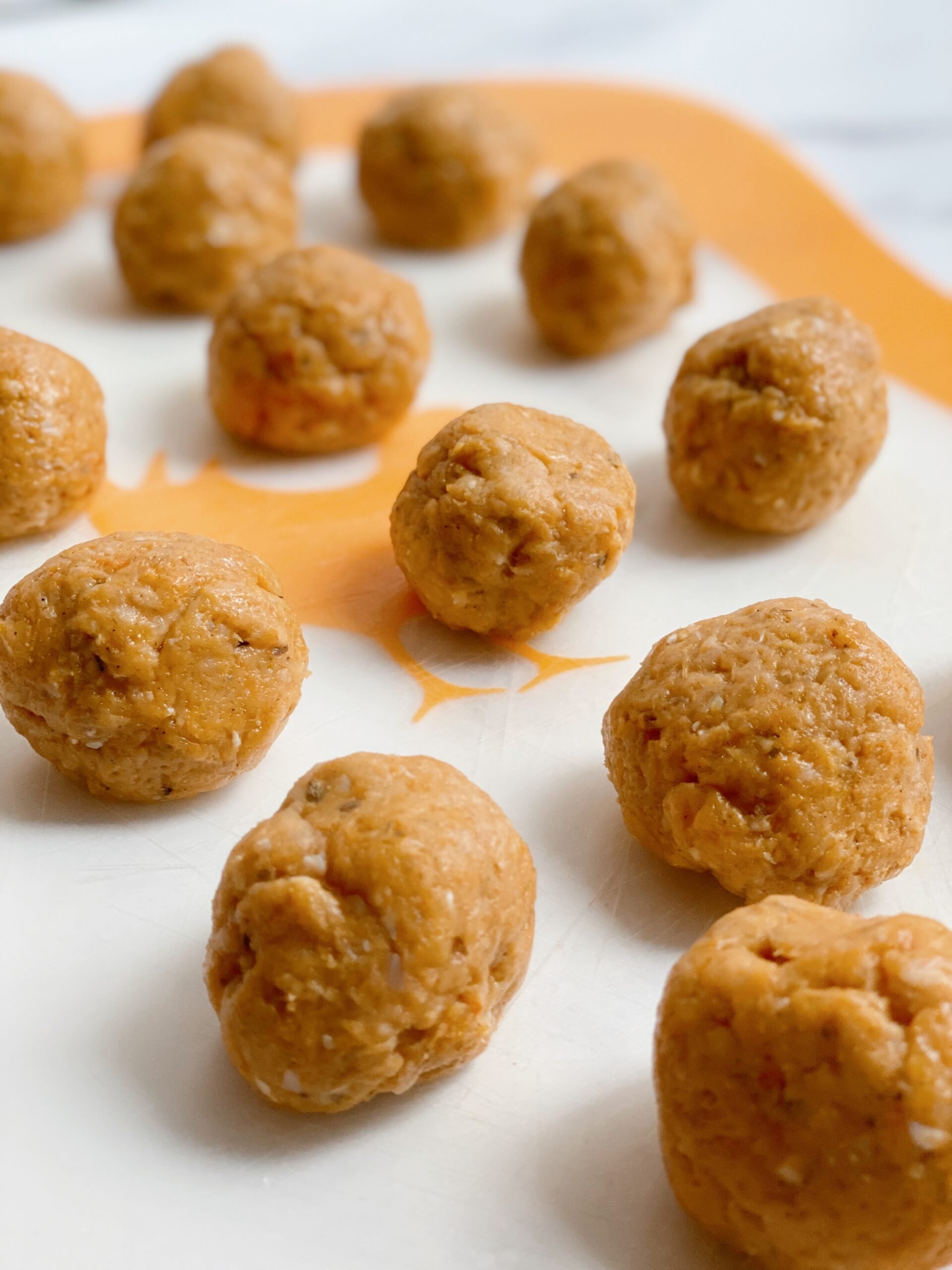 Close up view of uncooked chicken meatballs for Chicken Meatball Soup